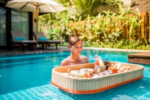Floating breakfast at STORY Seychelles in a private pool.