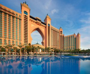 Luxury pool with palm trees in Dubai.