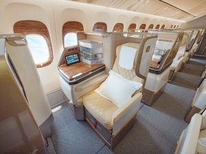 Emirates Business Class seat on Boeing 777 with window view © The Emirates Group